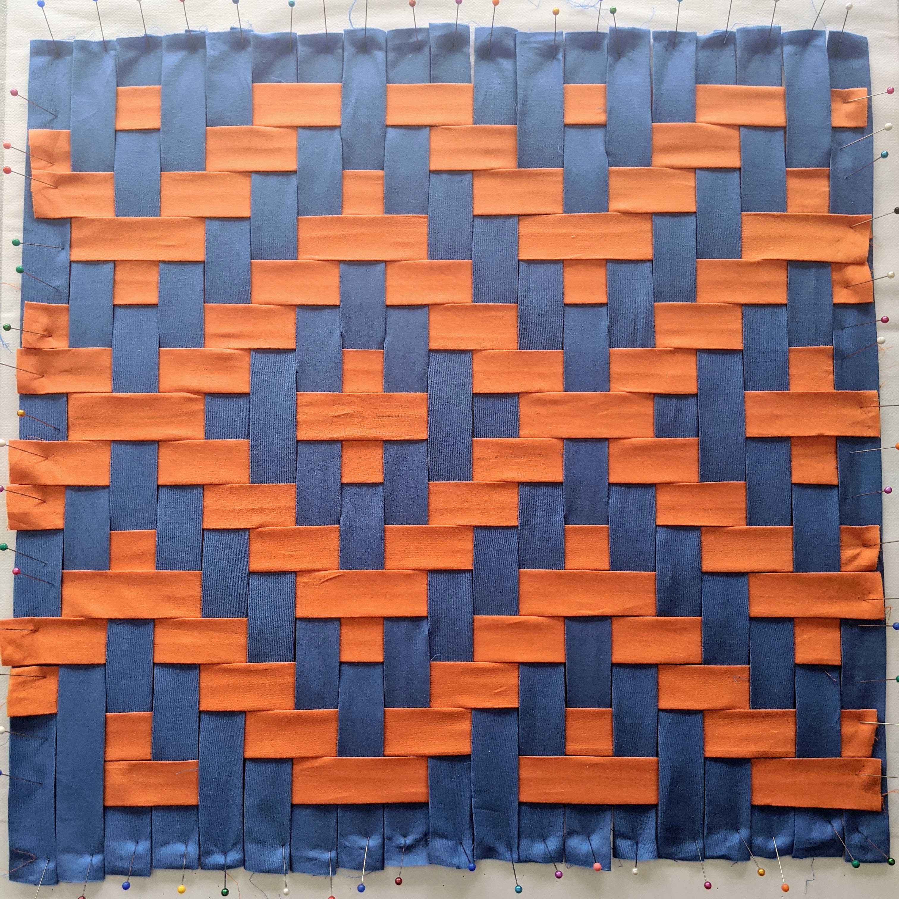 Learning to Weave with Fabric Strips: Triaxial Tumbling Block